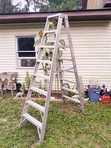 lot 21 image: Werner 8 ft aluminum ladder model t408