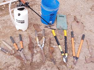 lot 28 image: pruners, loppers, pump sprayer, more
