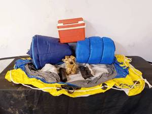 lot 50 image: Two sleeping bags, inflatable raft, cooler more