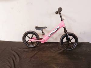 lot 54 image: Pink Strider classic hardly used