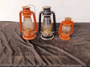 lot 67 image: Three oil lanterns, small Dietz and two others