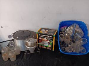 lot 93 image: Dehydrator, aluminum stock pot, random jars