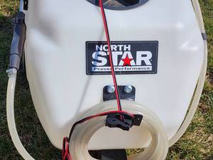 lot 25 image: Northstar Tow Behind ATV  Riding Lawn Mower Broadcast Sprayer