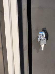 lot 12 image: Husky Locking Garage Storage Cabinet with Key