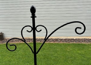 lot 201 image: Ornate Black Metal Yard Decor