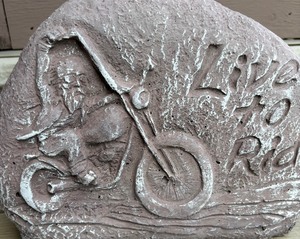 lot 207 image: Cement Live to Ride Decor