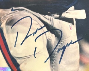 lot 276 image: Autographed #27 Ron Dayne Football Plaque with Trading Card and Certificate of Authenticity