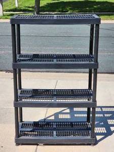 lot 69 image: Lightweight Plastic Garage Shelving Unit