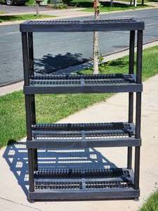 lot 66 image: Lightweight Plastic Garage Shelving Unit