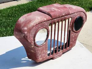 lot 74 image: Metal Jeep Grille Wall Decor