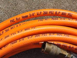 lot 102 image: Orange Air Hose
