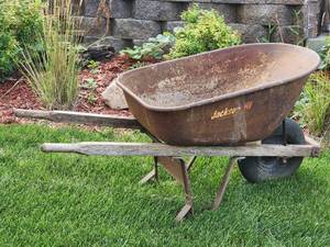 lot 146A image: Rustic Wheelbarrow Yard Decor