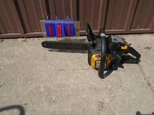 lot 101 image: Mac 3200 chainsaw 14 Still has paint on bar. Has gas leak. Fires on ether. As shown.