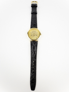 Gold Nugget Laughlin yellow plated stainless steel Quartz Analog watch. New Battery Installed. Comes in its Original Packaging