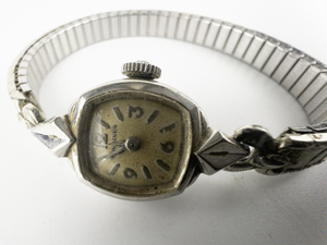 Ladys Longines  Silver Tone Stretch Band Mechanical Watch. Winds