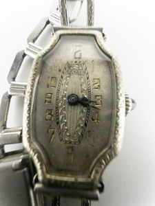 Benri  Vintage Filigree silver tone base metal Mechanical Watch. Winds.