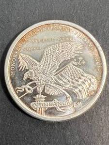 lot 11 image: 1 TROY OZ .999 FINE SILVER DONALD TRUMP ROUND
