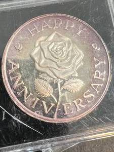 lot 50 image: 1 TROY OZ .999 FINE SILVER HAPPY ANNIVERSARY ROUND IN CASE