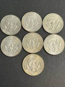 lot 54 image: GROUP OF 7 US 40% KENNEDY HALF DOLLARS