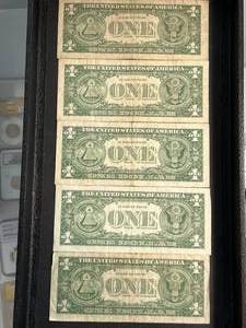 lot 83 image: GROUP OF 5 US BLUE SEAL $1 SILVER CERTIFICATES