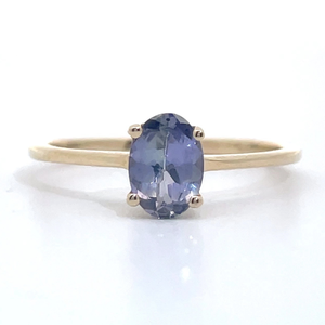 Petite Oval Tanzanite Solitaire Ring in Yellow Gold