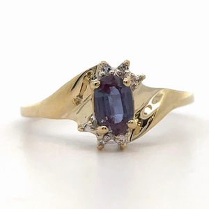 Oval Tanzanite & Diamond Bypass Ring in Yellow Gold