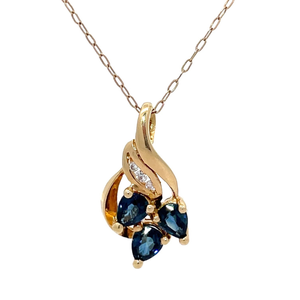 Blue Sapphire & Diamond Ribbon Corsage Pendant Necklace in 14k Yellow Gold