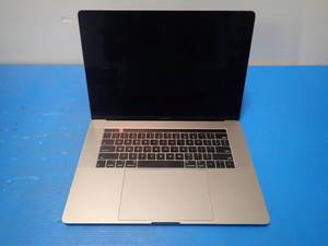 lot 37 image: Apple&nbspMacBookPro15,1 A1990 MR932LLA &nbspINTEL(R) CORE(TM) I7-8750H CPU  2.20GHZ  16GB DDR4 RAM  251GB SSD  15 screen with 3360 x 2100 Resolution  Includes IOS and Charger  slight keymarks on screen