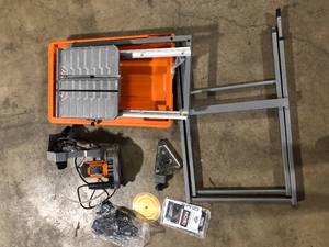 lot 13 image: RIDGID 9-Amp 7 in. Blade Corded Wet Tile Saw with Stand Customer Returns See Pictures