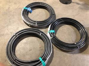 lot 26 image: Lot of  IPEX 1 in. x 100 ft. Black Polyethylene 160 PSI NSF Tubing Pipe  Customer Returns See Pictures