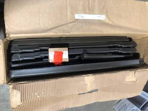 lot 35 image: Suncast Elements Plastic Outdoor Coffee Table with Storage- Java  Customer Returns See Pictures