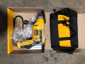 lot 36 image: DEWALT 8 Amp Corded 38 in. Variable Speed Drill  Customer Returns See Pictures