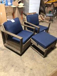 lot 39 image: 3-Piece Wicker Outdoor Rocking Chair Patio Conversation Set Swivel Chairs with Blue Cushions and Side Table  Customer Returns See Pictures