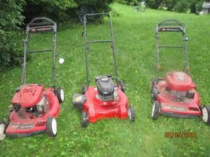 Trio of Toro push lawnmowers for...