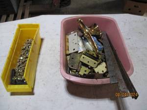 Large assortment of hinges, nuts an...