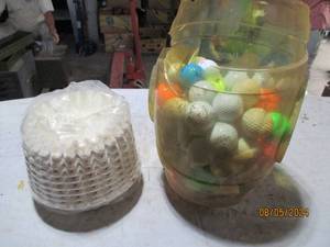 Large assortment of golf balls and ...