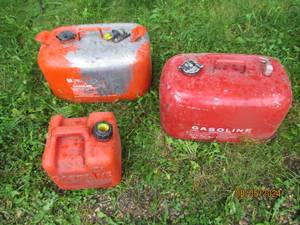 Lot of metal and plastic watering c...