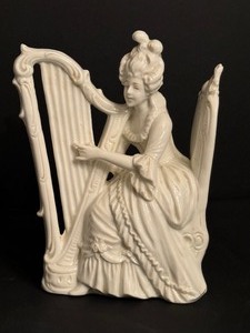 lot 36 image: Pair of Vintage Capodimonte Blanc de China Figurines
