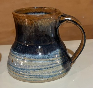 lot 403 image: Four Pretty Artisan Crafted Pottery Mugs