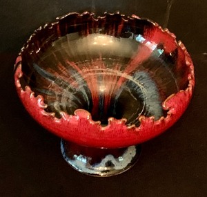lot 362 image: Pottery Bowl with Jagged Edges Black and Red Swirl Paint