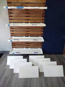 Retail Wall Display Shelves with 8 Slanted Display Triangles As Seen