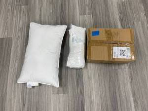 (1) box with Weekender down alternative compressed pillow 2-pack Standard, and (2) Weekender down alternative pillows