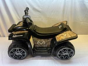 lot 1 image: Dynacraft 6V Light up QuadRealtree