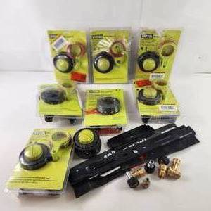 lot 94 image: Lot Of Ryobi Bump Feed Trimmer Heads Lawn Mower Blades And More