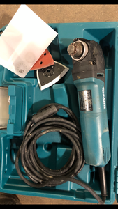 Makita 3 Amp Corded Variable Speed Oscillating Multi-Tool Kit With Blade, Sanding Pad, Sandpaper, Adapter, Hard Case   Customer Returns See Picture