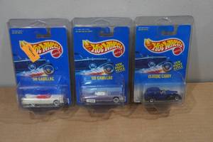 lot 274 image: 3 Hot Wheels Cadillac Cars