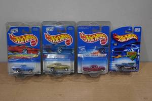 lot 276 image: 4 Hot Wheels Muscle Cars - T Bird, Chevelle, Chevy Impala