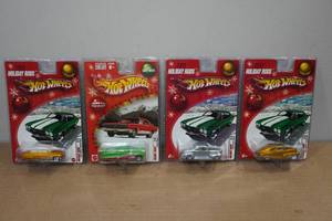 lot 279 image: 4 Hot Wheels Holiday Rods Special Edition Cars