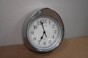 lot 14 image: 1950s Chevy Chrome Head Light Bezel Clock