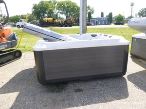 lot 5 image: NEW Axel-L 5 Person Hot Tub MSRP $23,999